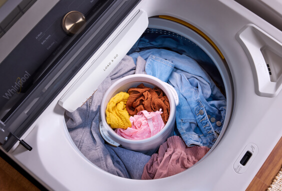 Top load washer with delicates basket